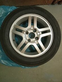 Prodám pneu 195/60/R15 88V na disku Ford