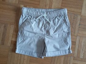 Plátěné kraťasy béžové KIK vel. 128/134