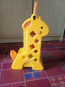 Žirafa s kostkami zn.Fiaher Price