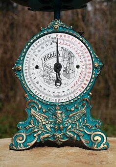 Starožitná figurální litinová váha Hella 1885