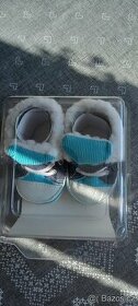 Nové  dětské  botičky  + nové  papučky + spací pytel - 1