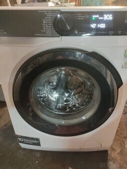 parní pračka Aeg LFR 9384 uc ,8kg,0-1400 ot.wifi A+++