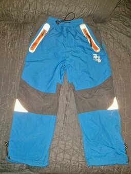 Zimní modré zateplené kalhoty zn. Kugo vel. 116