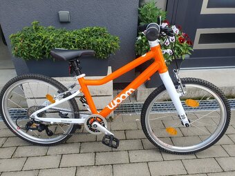 Woom 4 (20") novy v zaruce se stojankem