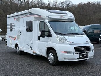 Obytné auto  Carado T348, sjížděcí postel, 2012, držák moto.