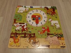 Dřevěné hodiny a zvířecí vkládačka