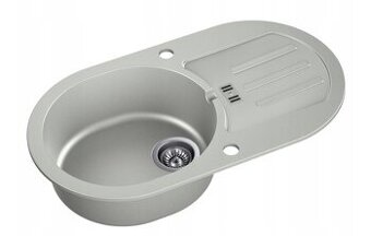 Nepoužitý granitový dřez s odkapávačem a baterií