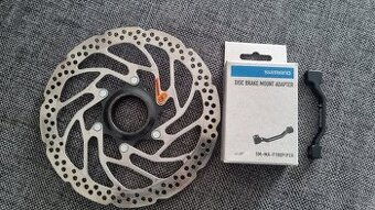 Kotouc 180mm centrlock + shimano adapter