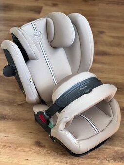 50% sleva - Cybex Pallas G2 i-Size Beige Plus 2025