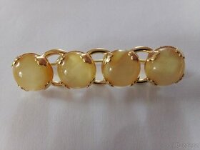 staré brože s uranového skla dvě fotky