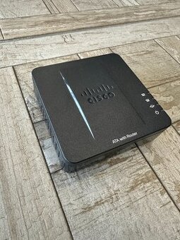 Brána s routerem Cisco SPA122