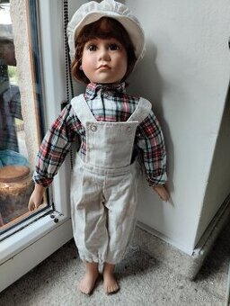 Porcelánový chlapeček mlynář