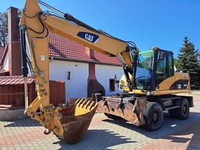 CATERPILLAR M316D - kolové rýpadlo