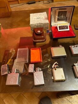 Sbírka po sběrateli 19x zapalovačů + obal na Zippo