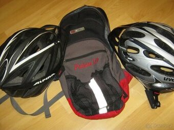 Dvě cyklistické helmy Uvex a Alpina + batoh LOOP