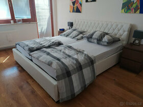 Dvoulůžková postel 180x200 s úložným prostorem. Ekokůže bílá