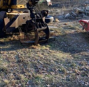 Drapák s rotátorem