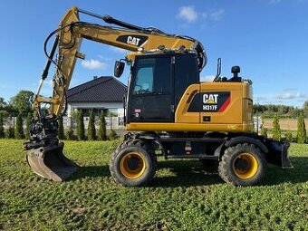 Kolový otočný bagr CAT M317F