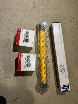 Sportovní zadní tlumiče a ložiska kol