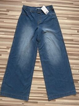 Nové moderní kalhoty H&M