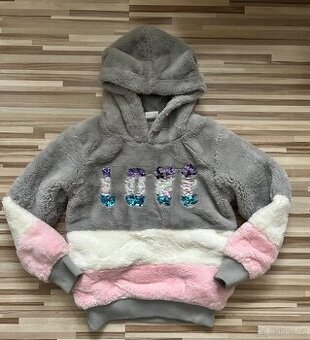 Teplá kožíškova bunda