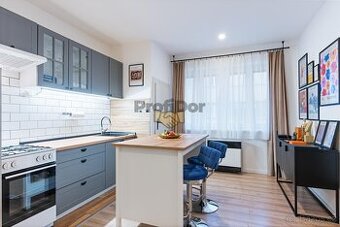 Pronájem bytu 2+kk s parkovacím místem a zahrádkou na ul. M.