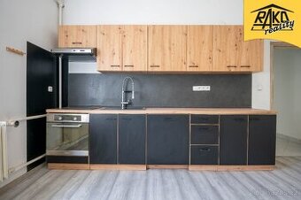 Prodej bytu 3+kk se zahrádkou a garáží