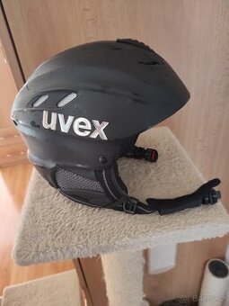 Lyžařská helma UVEX a REUSCH