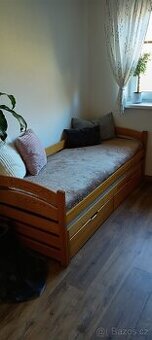 Dvoulůžková postel