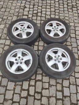 Prodám orig alu 15 škoda Octavia 1 5x100 ET 38 letní pneu