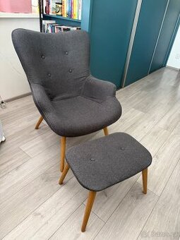 Křeslo s podnožkou SKALBORG tm. šedá
