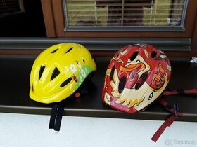 Prodám  2 ks  dětské helmy na kolo