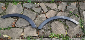 Kia Sportage III - Plastové lemy a kryt prahu.