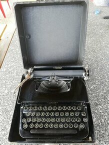 kufříkový psací stroj CORONA