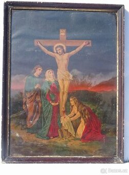 Staré obrazy v dřevěném rámu .