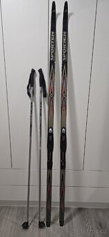 Běžecké lyže Sporten + hůlky