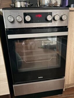 kombinovaný stříbrný sporák Amica, eng. třída A