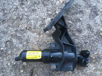 Ostřikovač světel levý Ford Mondeo mk3