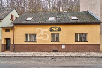 Prodej domu se zahradou a dvougaráží k bydlení i investici v