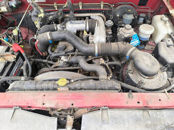 Opel campo 2.5TD  56kw Motor+převodovka a další