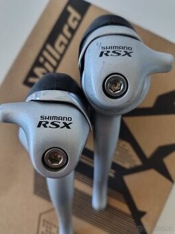 Brzdové a řadící páky na kolo