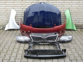Škoda Rapid , kapota ,nárazník , blatník ,světlo.