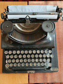 Starý psací stroj GIBIAN
