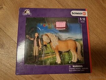 Schleich 41431 Klisna Islandského pony s ošetř. - 1