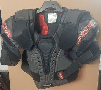 Hokejová vesta, kalhoty, chrániče, taška