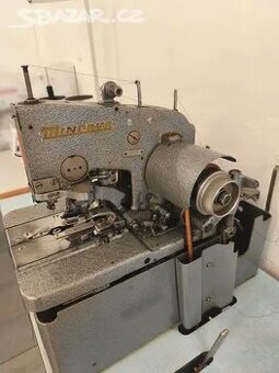 Šicí stroj - dírkovačka