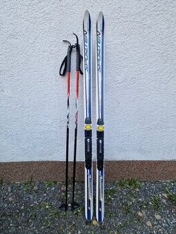 Dětské běžky 130cm + hůlky 110cm