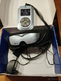 Masážní přístroj pro péči o oči.