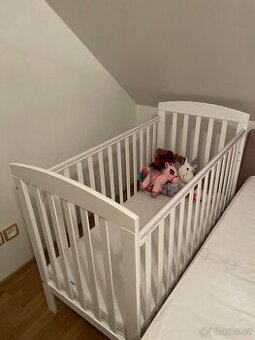 Dětská postýlka Drewex Olek se stahovací bočnicí Bílá