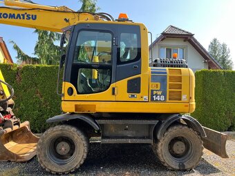 KOMATSU PW148-8 Rototilt 14.435 kg
